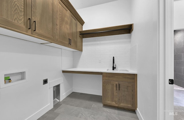 11321 S Yeoman St, Kuna, ID 83634 - laundry area with cabinet space, hookup for an electric dryer, washer hookup, and baseboards