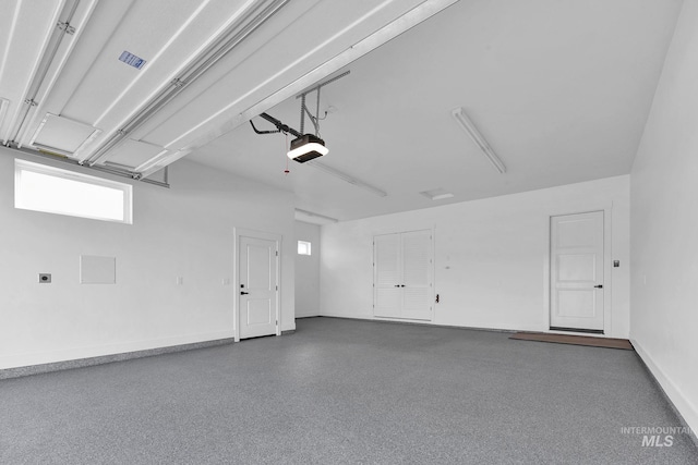 11321 S Yeoman St, Kuna, ID 83634 - garage with a garage door opener and baseboards
