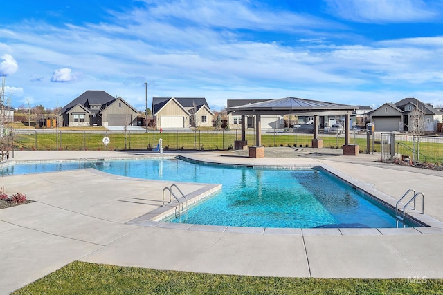 11321 S Yeoman St, Kuna, ID 83634 - community pool featuring a residential view, a gazebo, and a patio