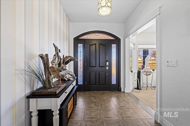 entrance foyer featuring baseboards