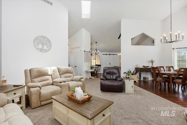 34 S 150 E, Burley, ID 83318 - living room featuring a chandelier, high vaulted ceiling, and light carpet