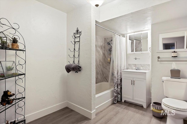 34 S 150 E, Burley, ID 83318 - bathroom with wood finished floors, toilet, shower / bathtub combination with curtain, vanity, and baseboards