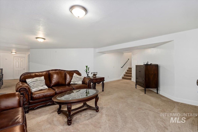 34 S 150 E, Burley, ID 83318 - living area featuring light colored carpet, stairway, and baseboards