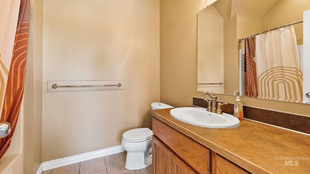 full bath featuring tile patterned floors, vanity, toilet, baseboards, and curtained shower