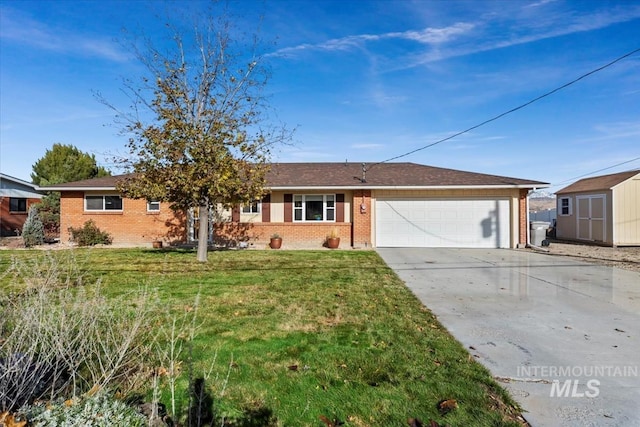 ranch-style home with a shed, a front lawn, and a garage