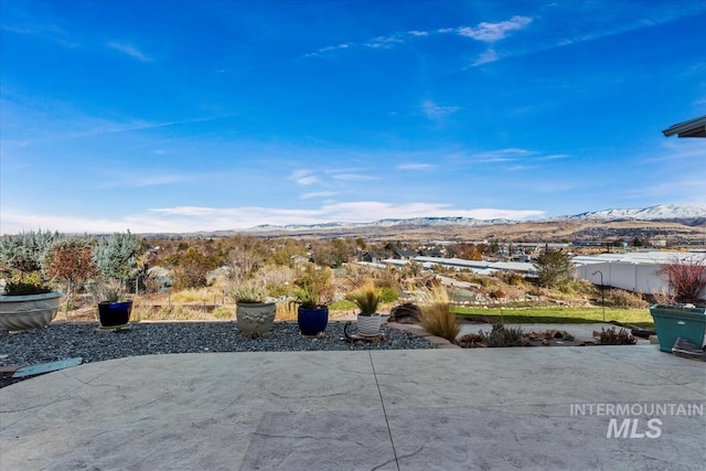 exterior space featuring a mountain view