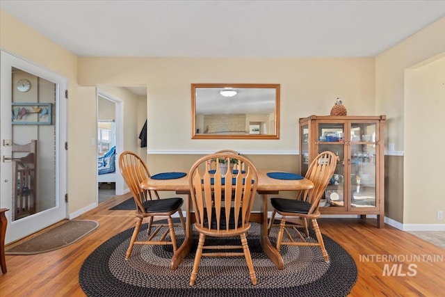 dining room featuring wood-type flooring