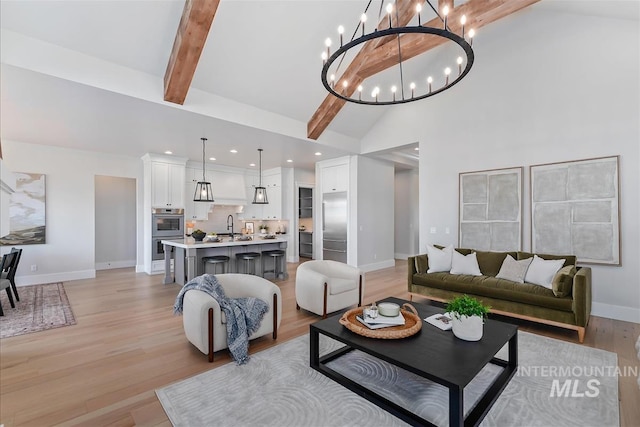 living room with high vaulted ceiling, recessed lighting, baseboards, light wood-type flooring, and beamed ceiling