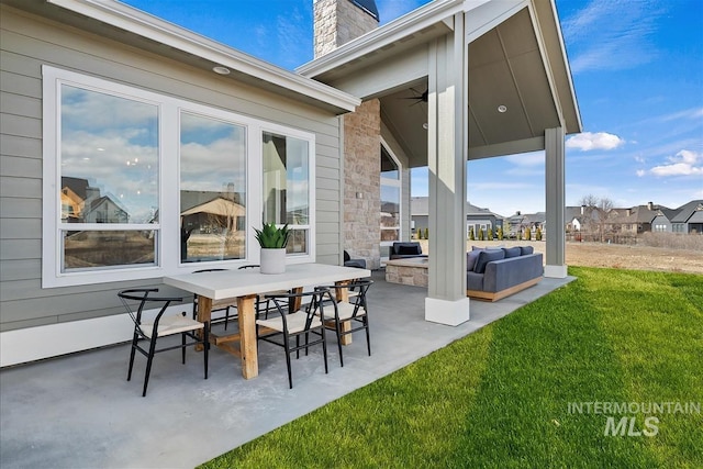 view of patio featuring ceiling fan and an outdoor hangout area