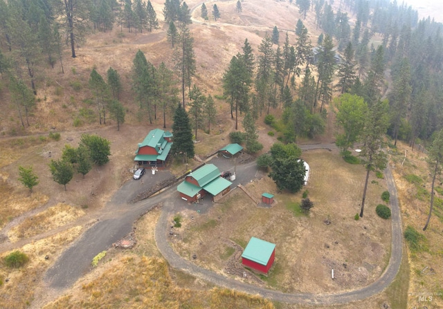 birds eye view of property featuring a rural view