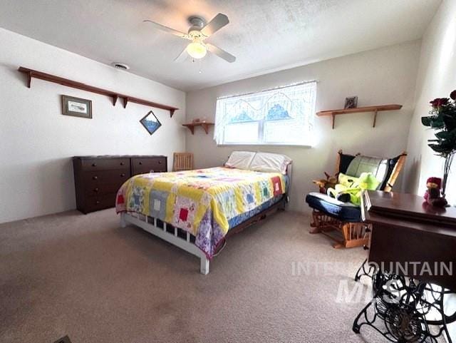 bedroom with carpet and ceiling fan