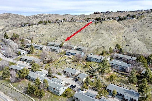 bird's eye view with a mountain view