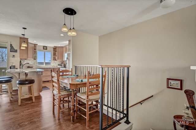 dining area featuring wood finished floors