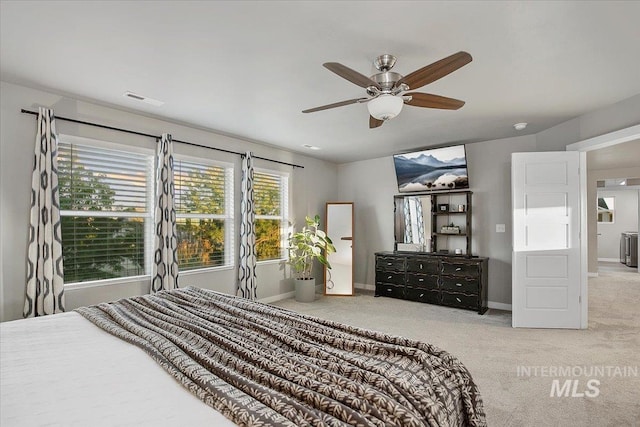 carpeted bedroom with ceiling fan