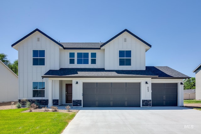 modern farmhouse style home with a garage