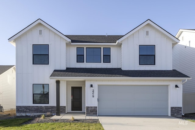 2219 W Cascara St, Kuna, ID 83634 - modern farmhouse featuring board and batten siding, roof with shingles, a garage, and concrete driveway