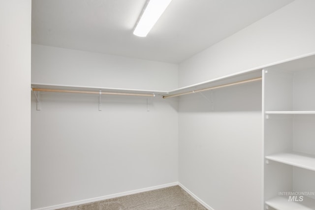 2219 W Cascara St, Kuna, ID 83634 - unfurnished bedroom featuring visible vents, baseboards, ensuite bathroom, and carpet flooring
