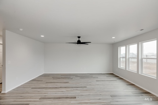 2219 W Cascara St, Kuna, ID 83634 - kitchen with modern cabinets, black appliances, light brown cabinetry, and a sink