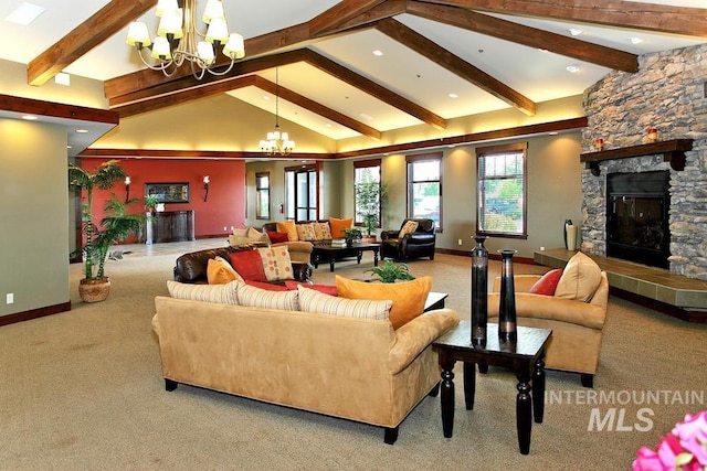 carpeted living room featuring a chandelier, beamed ceiling, a fireplace, and high vaulted ceiling