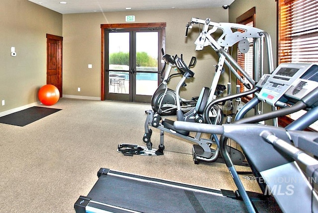 gym featuring french doors