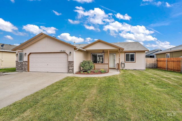single story home with an attached garage, driveway, a porch, and a ceiling fan