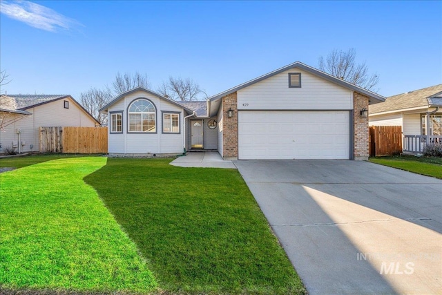 ranch-style home with a front lawn and a garage