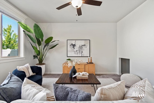 2252 E Tiger Lily Dr, Boise, ID 83716 - carpeted living room featuring ceiling fan and baseboards