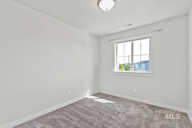 2252 E Tiger Lily Dr, Boise, ID 83716 - spare room with baseboards and carpet flooring