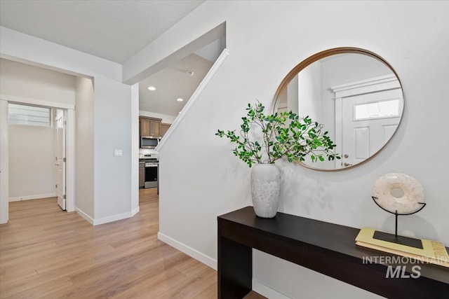 2252 E Tiger Lily Dr, Boise, ID 83716 - hallway featuring light wood-style flooring, baseboards, and recessed lighting