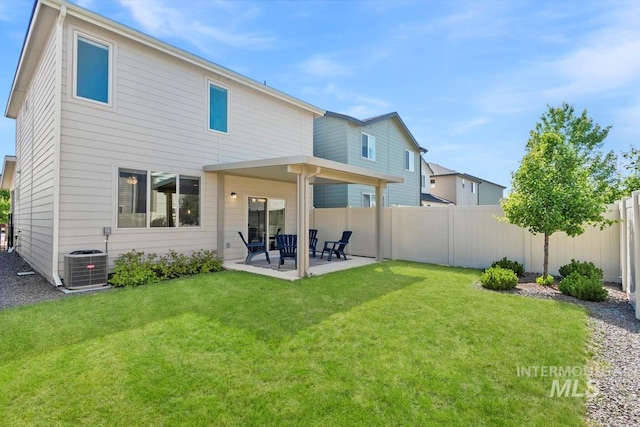 2252 E Tiger Lily Dr, Boise, ID 83716 - back of house with central AC and a patio area