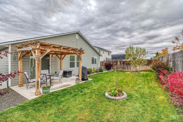 back of house featuring a pergola and a patio