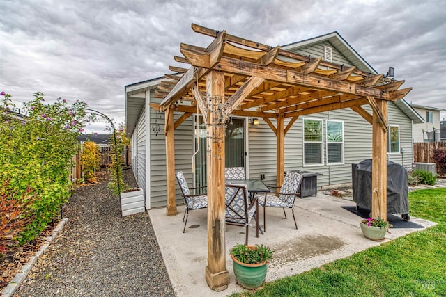 view of patio / terrace featuring a pergola, a fenced backyard, area for grilling, and cooling unit