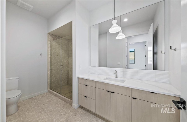 4340 E Haystack St Unit 304, Boise, ID 83716 - full bath with vanity, toilet, a shower stall, baseboards, and recessed lighting