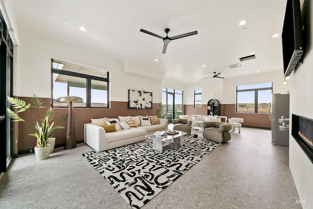 4340 E Haystack St Unit 304, Boise, ID 83716 - living area with a ceiling fan, recessed lighting, and a glass covered fireplace