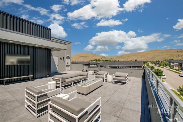 4340 E Haystack St Unit 304, Boise, ID 83716 - view of patio featuring a mountain view and an outdoor living space