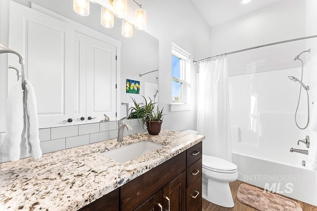 full bathroom with shower / bath combination with curtain, vanity, toilet, and wood-type flooring