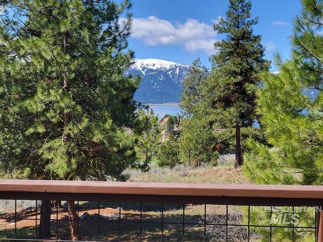 mountain view featuring a water view
