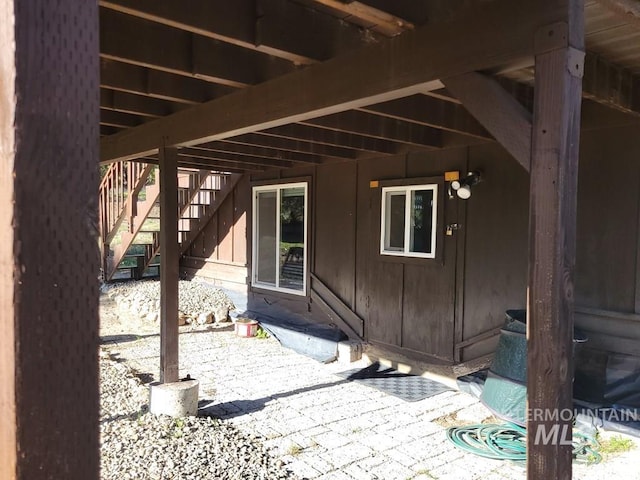 view of patio with stairway