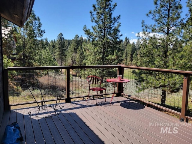 deck with a view of trees