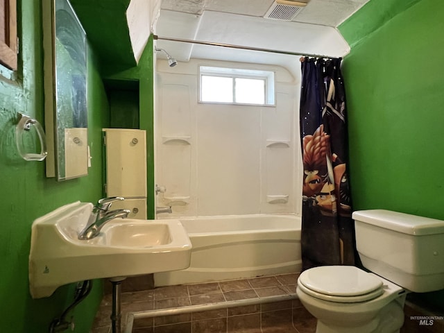 278 Taylor St, Twin Falls, ID 83301 - bathroom with toilet, tile patterned flooring, and shower / bathtub combination with curtain