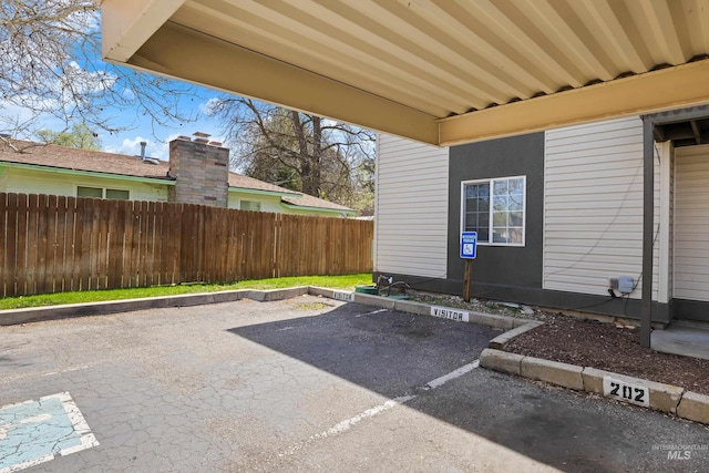 view of patio / terrace featuring fence