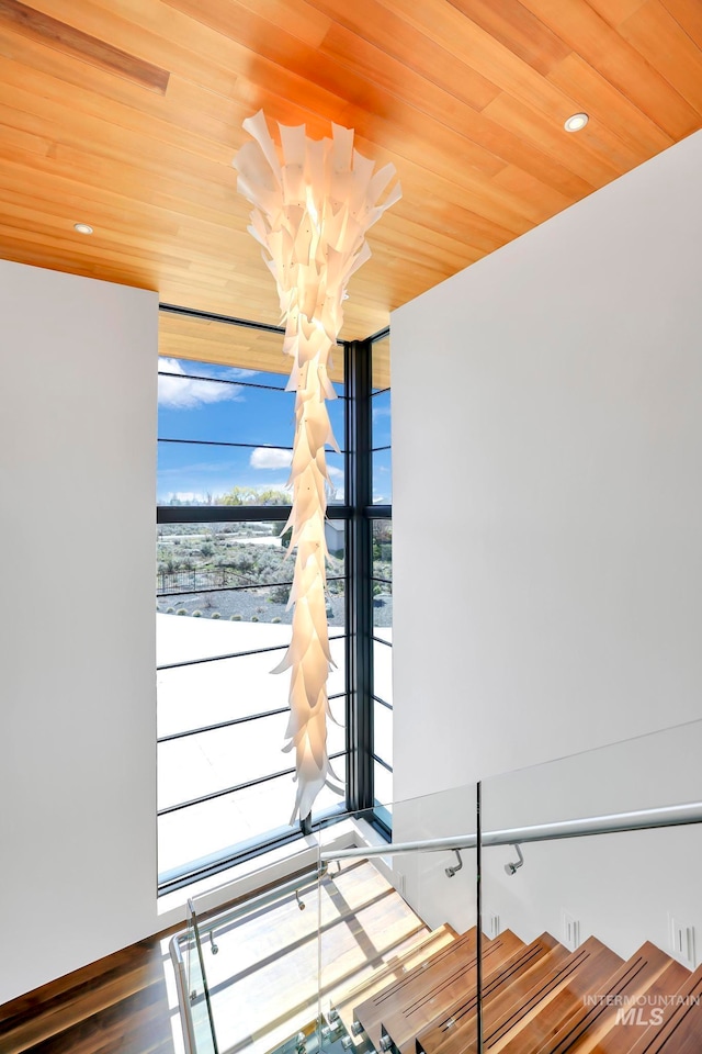 interior space featuring wood-type flooring and wood ceiling