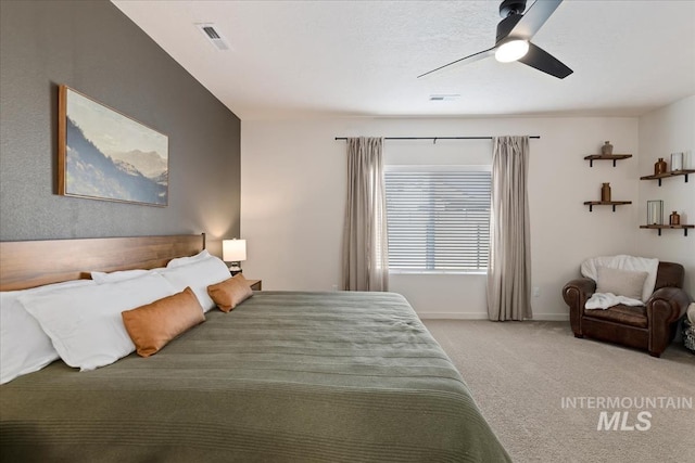 19321 Geneva Way, Caldwell, ID 83605 - bedroom with visible vents, carpet flooring, baseboards, and a ceiling fan