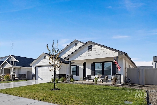 19321 Geneva Way, Caldwell, ID 83605 - view of front facade featuring a front lawn, driveway, an attached garage, fence, and a porch