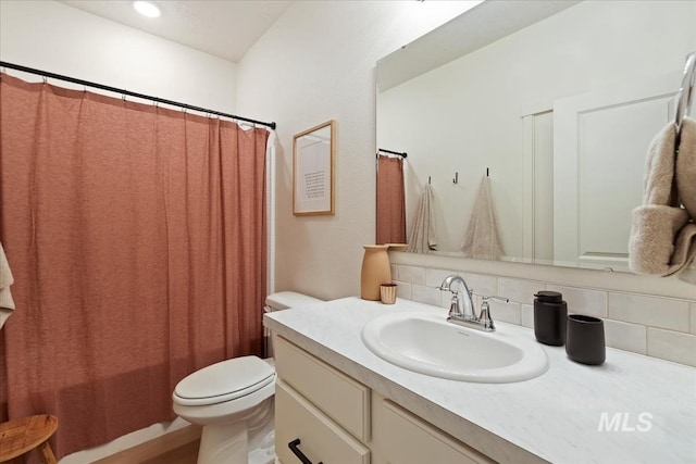 19321 Geneva Way, Caldwell, ID 83605 - full bath featuring toilet, tasteful backsplash, and vanity