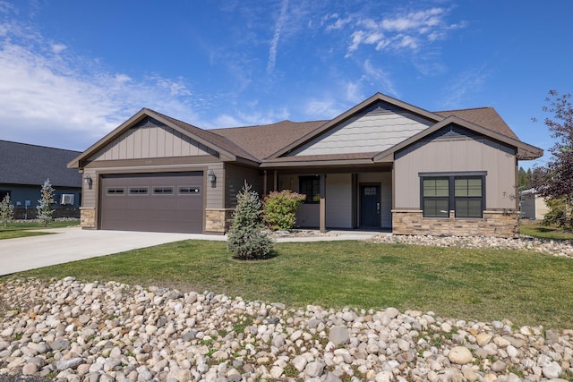 craftsman-style home featuring a front yard and a garage