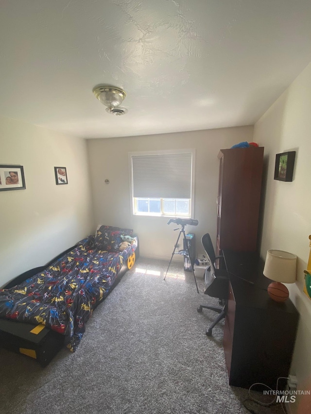 bedroom with visible vents and carpet floors