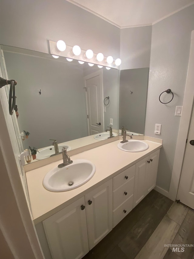 2024 Julie Ln, Twin Falls, ID 83301 - bathroom with wood finished floors and double vanity