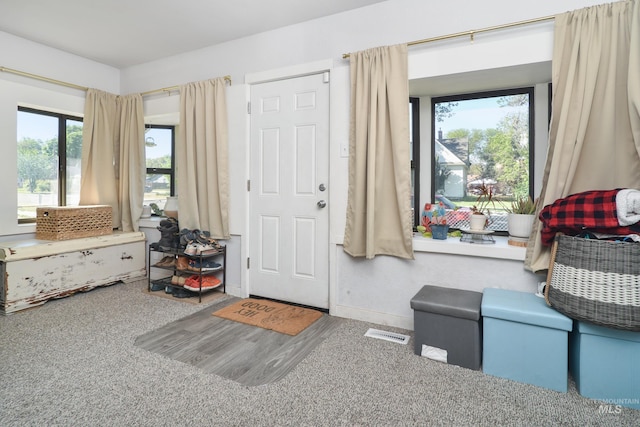 1713 Blaine St, Caldwell, ID 83605 - entrance foyer with carpet floors and baseboards