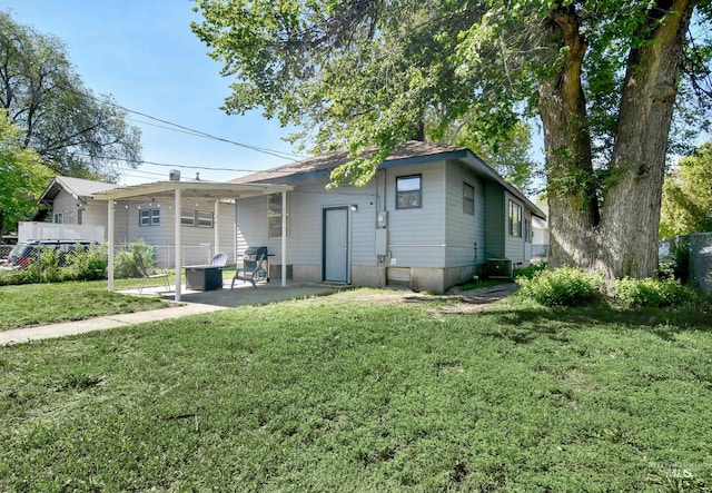 1713 Blaine St, Caldwell, ID 83605 - rear view of house featuring a patio area and central air condition unit